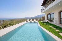 Geroulios Kastro Villas I "Free" Heated Pools & Seaview - Chambres d’hôtes Vatoudiáris