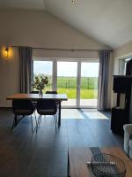 Watt´n Blick - Hundefreundliches Ferienhaus mit Ausblick über die Wiesen bis zum Deich - Chambres d'hôtes Schweiburg