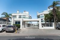 Condomínio à Beira-mar com Piscina em Morro das Pedras - PROs - B&B Florianópolis