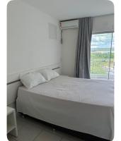 Flat com vista do lago e piscina aquecida - Chambres d’hôtes Caldas Novas