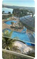 Flat com vista do lago e piscina aquecida - B&B Caldas Novas