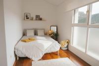 Habitación con encanto con cafetera y sofá - B&B Santullán