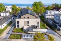 Ankerplatz 3 - Moderne Ferienwohnung mit Terrasse und Sauna - strandnah! - B&B Kellenhusen