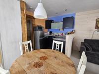 Appartement rez de jardin et garage privé - B&B Plagne 1800