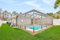 Brand-new duplex with screened pool, furnished lanai, AC, & washer dryer - Bed and Breakfast Palm Coast