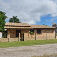 Casa pé na areia a 50 metros da praia - Chambres d’hôtes Itapoá