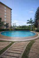 Puerto Princesa Condo 2 Beds with Balcony Gym and Pool - Bed and Breakfast Puerto Princesa City