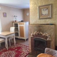 House with a fireplace - Ferienwohnung Dünaburg