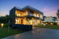 ELIVAAS Signature Gardenia 4-BHK Farmhouse with Private Pool, Game Zone, & Lush Garden - B&B Dera Māndi