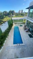 Spacious 3-Bedroom Apartment with Pool Access in Juan Dolio - Chambres d'hôtes Juan Dolio