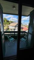 Apto 2D ensolarado, sacada e garagem, centro - B&B Nova Petrópolis