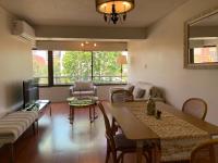 Cómodo departamento frente a Mall Parque Arauco - Chambres d'hôtes Santiago