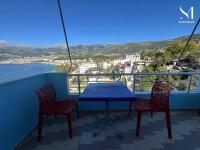 One-Bedroom Apartment with Balcony and Sea View