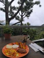 Cabañas y café Kauani - Chambres d'hôtes El Guayabo