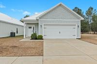 Beachy cottage near Sports Complex OWA beaches shopping restaurants mini golf Central to all the fun Foley has to offer - B&B Foley