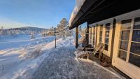 Fjellhytte med boblebad og utsikt på Blefjell - B&B Flesberg