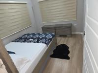 Snuggle Inn - Ferienwohnung D’Abadie