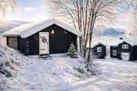 Sjarmerende tømmerhytte på gårdstun - B&B Baukål