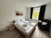 Haus OstseeWelle - Bootshaus - Ferienwohnung Dahme