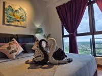 Suite met Queensize Bed en Uitzicht op Zee