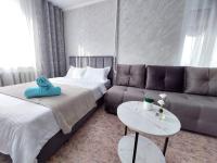 Уютная квартира с удачным расположением - Chambres d'hôtes Lisakovsk