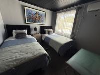 Chambre Lits Jumeaux avec Salle de Bains Privative