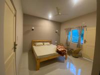 The White Flower Homestay - Bed and Breakfast Kāthgodām