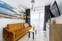 Ku Morzu Nadmorski Apartament w Pobliżu Plaży z Basenem i Parkingiem by Noclegi Renters - B&B Sianożęty