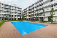 Ku Morzu Nadmorski Apartament w Pobliżu Plaży z Basenem i Parkingiem by Noclegi Renters - Chambres d'hôtes Sianożęty