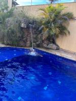 Casa de praia com piscina quartos suite - Bed and Breakfast Guarujá