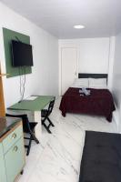 Studio Moderno com Garagem Self Check-in 24h - Chambres d’hôtes Passo Fundo