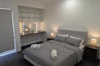 Private 2-Bedroom Flat in Oxenford - Quiet, Comfortable & Close to Theme Parks - B&B Gold Coast