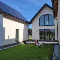 Fala Odpoczynku - Nowe Domki Nad Morzem w Lubiatowie - Chambres d'hôtes Lubiatowo