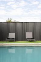 3BR Little Coastal Boho Home - Neverending Summer Fun near Themeparks & close to M1 exit - Chambres d’hôtes Pimpama