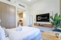 Elite LUX Holiday Homes - Contemporary Comfort Studio in Azizi Riviera - Chambres d'hôtes Dubaï