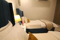 Cuzzy Inn Stay - Ferienwohnung Lahore