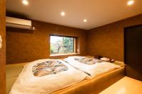 Japanese-Style Quadruple Room with Garden View with Open-Air Bath