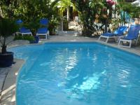 Appartement lumineux avec terrasse et piscine au Gosier - B&B Le Gosier