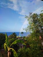 Ti Sucrier Jaune - Douceur caraïbe vue mer - B&B Le Carbet