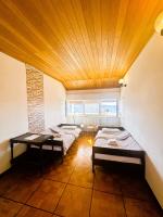 Camera Doppia con Letti Singoli con Bagno Privato Esterno 