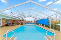 Tropic stay with large outdoor pool bikes AC & pool table - snowbird-friendly - B&B Perdido Key