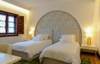 Doppel- oder Zweibettzimmer