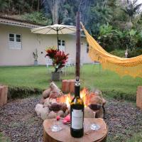 Casa Aconchegante com amplo jardim e fogo de chão - B&B Santa Teresa