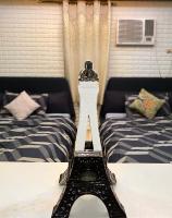 Cozy Escape at McKinley near Venice Grand Canal Mall - B&B Manila