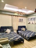 Cozy Escape at McKinley near Venice Grand Canal Mall - B&B Manila