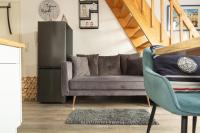 Kapitänshaus W16 E - Ferienwohnung Laboe