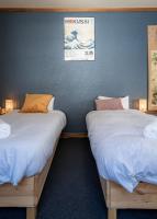 Vierpersoonskamer met Uitzicht op de Tuin.