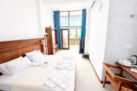 Chambre Double Deluxe avec Balcon - Vue sur Mer