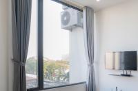 QUIZÁS Riverside Hotel & Residence - B&B Da Nang