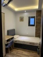 Room in a shared apartment - Bed and Breakfast Caïro